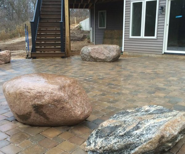 paver patio with boulder seating